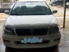 لانسر معلمين موديل 2002